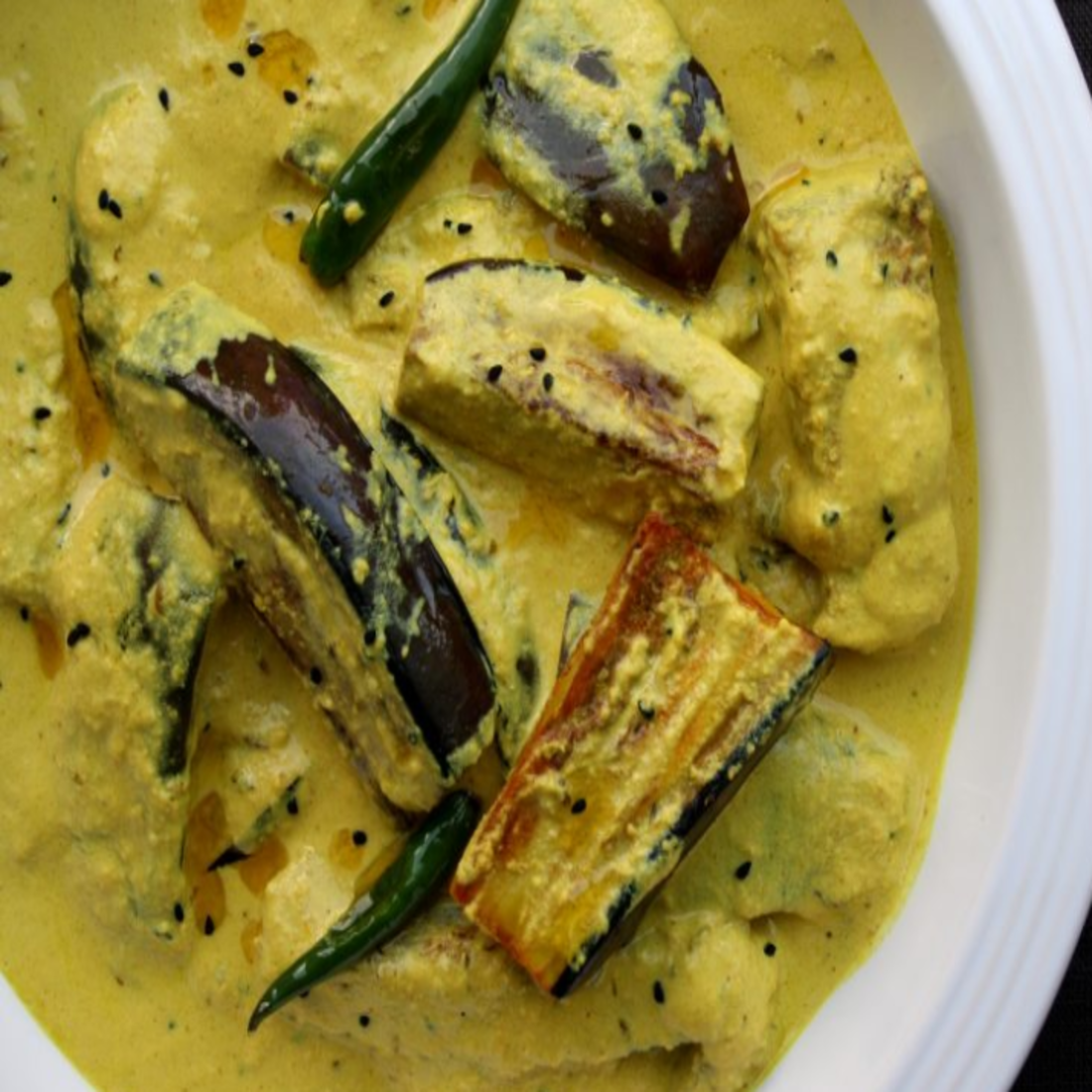 Tangy Zest And Textures Savoring The Shorse Begun Delight INDIA CUISINE tangy-zest-and-textures-savoring-the-shorse-begun-delight-india-cuisine